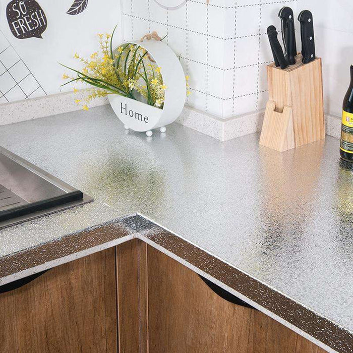 PAPEL ADHESIVO PARA COCINA – PROTECCIÓN TOTAL CONTRA LÍQUIDOS Y GRASAS